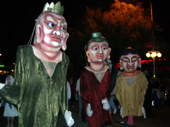 Big Head Puppets from 'The Good Woman of Setzuan' appear in the All Souls Procession